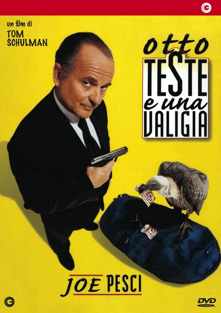 8 teste e una valigia